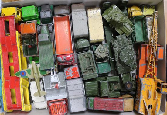 A collection of mostly Dinky and Matchbox commercial vehicles and military trucks, etc.